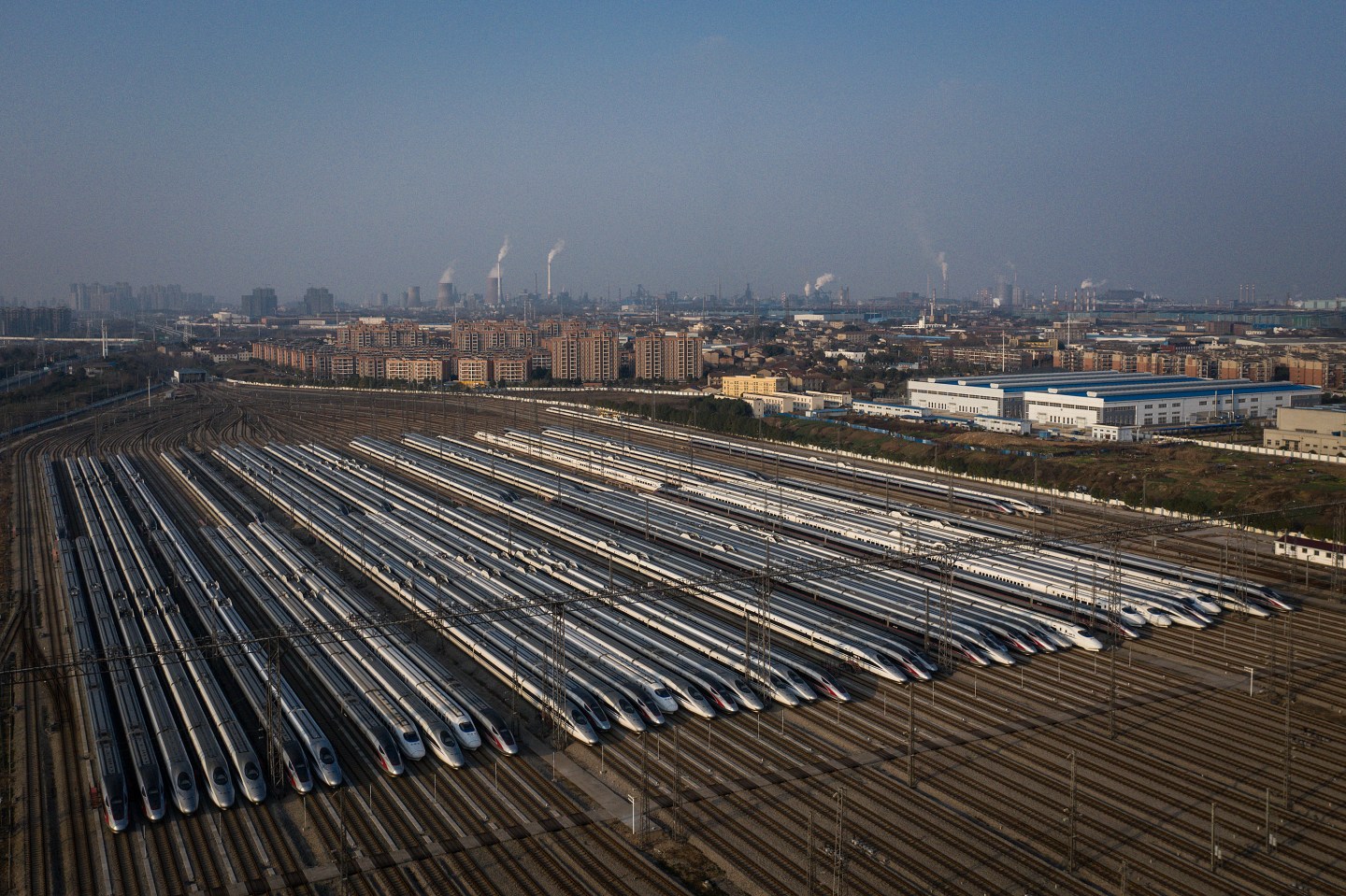 High speed trains remain in the train yard on February 9, 2020 in Wuhan, China. Flights, trains and public transport including buses, subway and ferry services have been closed for 18 days. The number of those who have died from the Wuhan coronavirus, known as 2019-nCoV, in China has climbed to 813. (Photo by Getty Images)