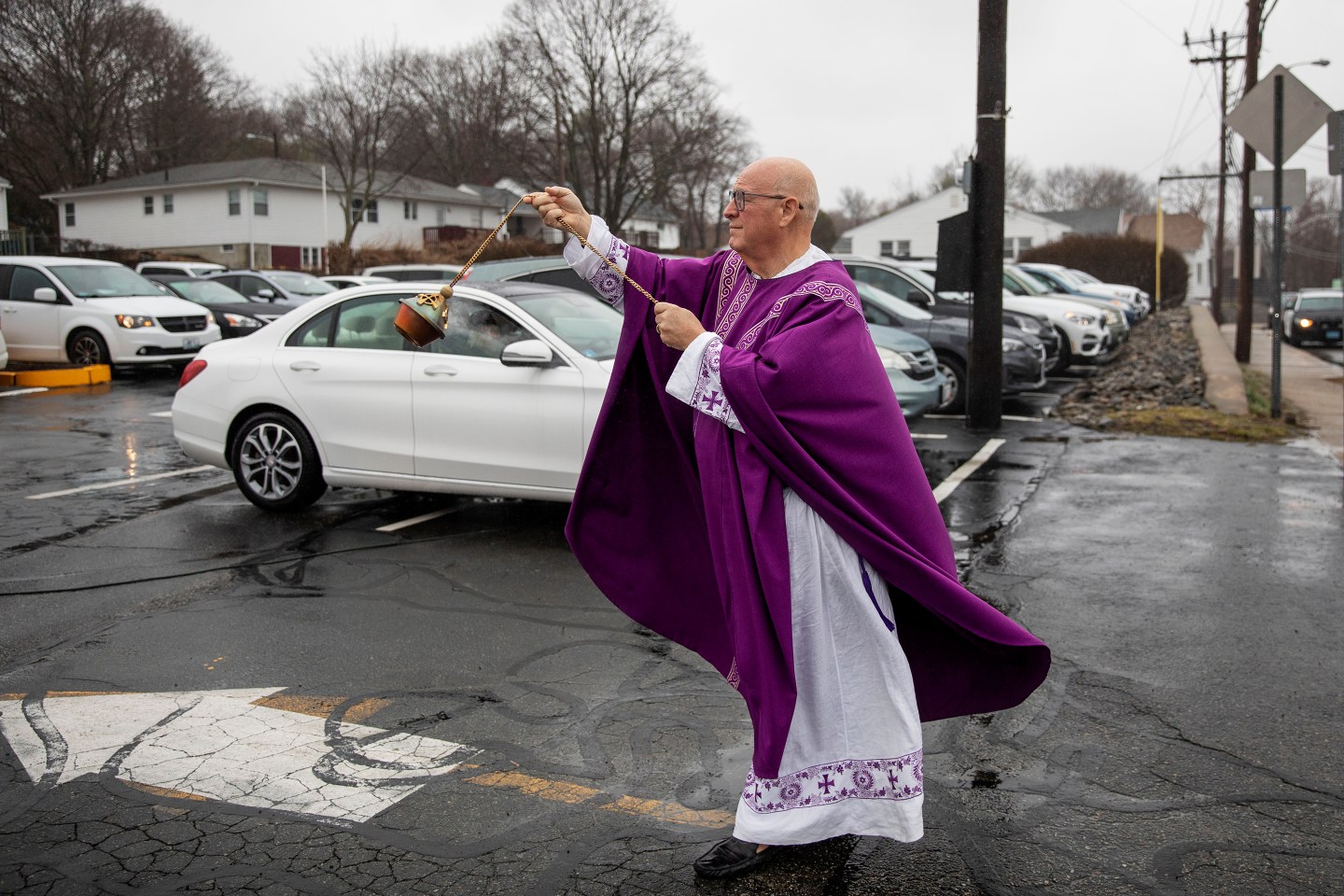 Coronavirus-Priest Parking Lot
