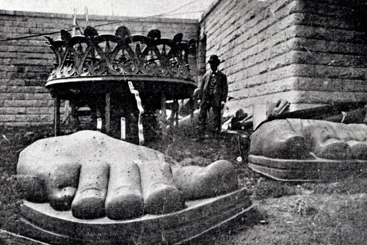 The feet of the Statue of Liberty arrive on Bedloe Island
