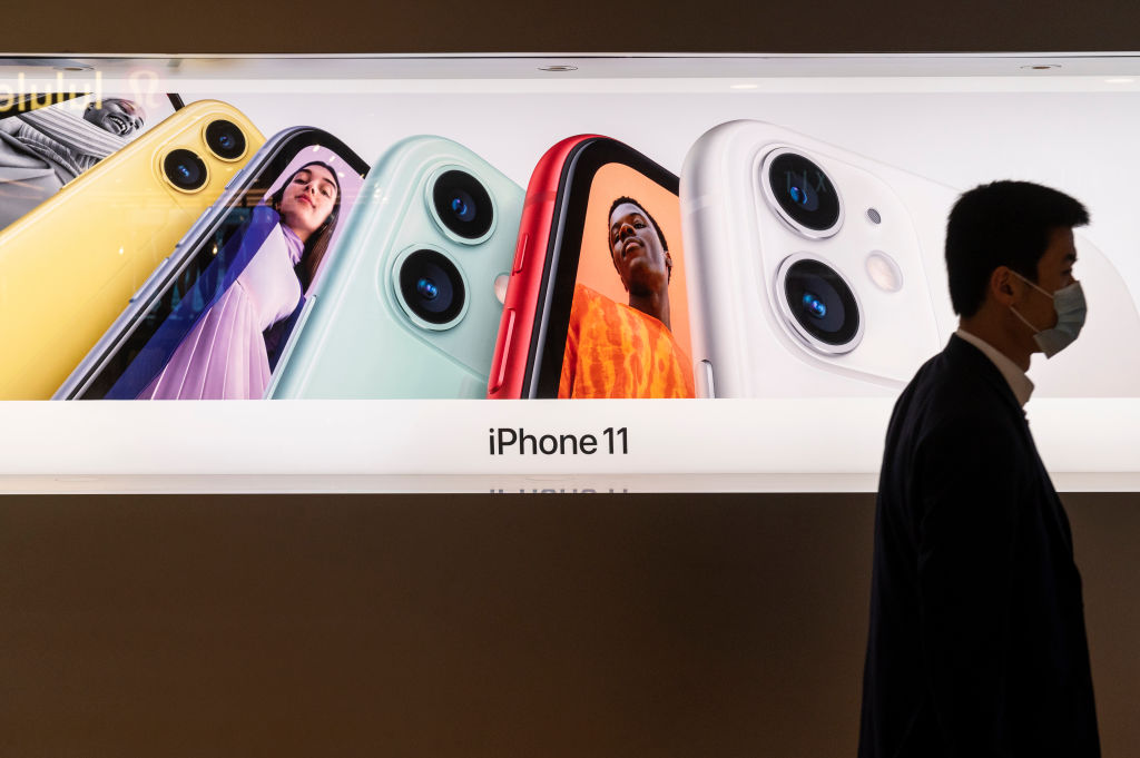 A man walks past the American multinational technology