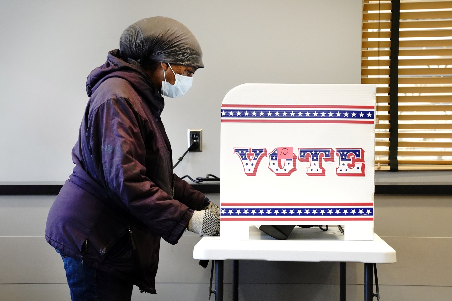 Commentary-Woman Early Voting