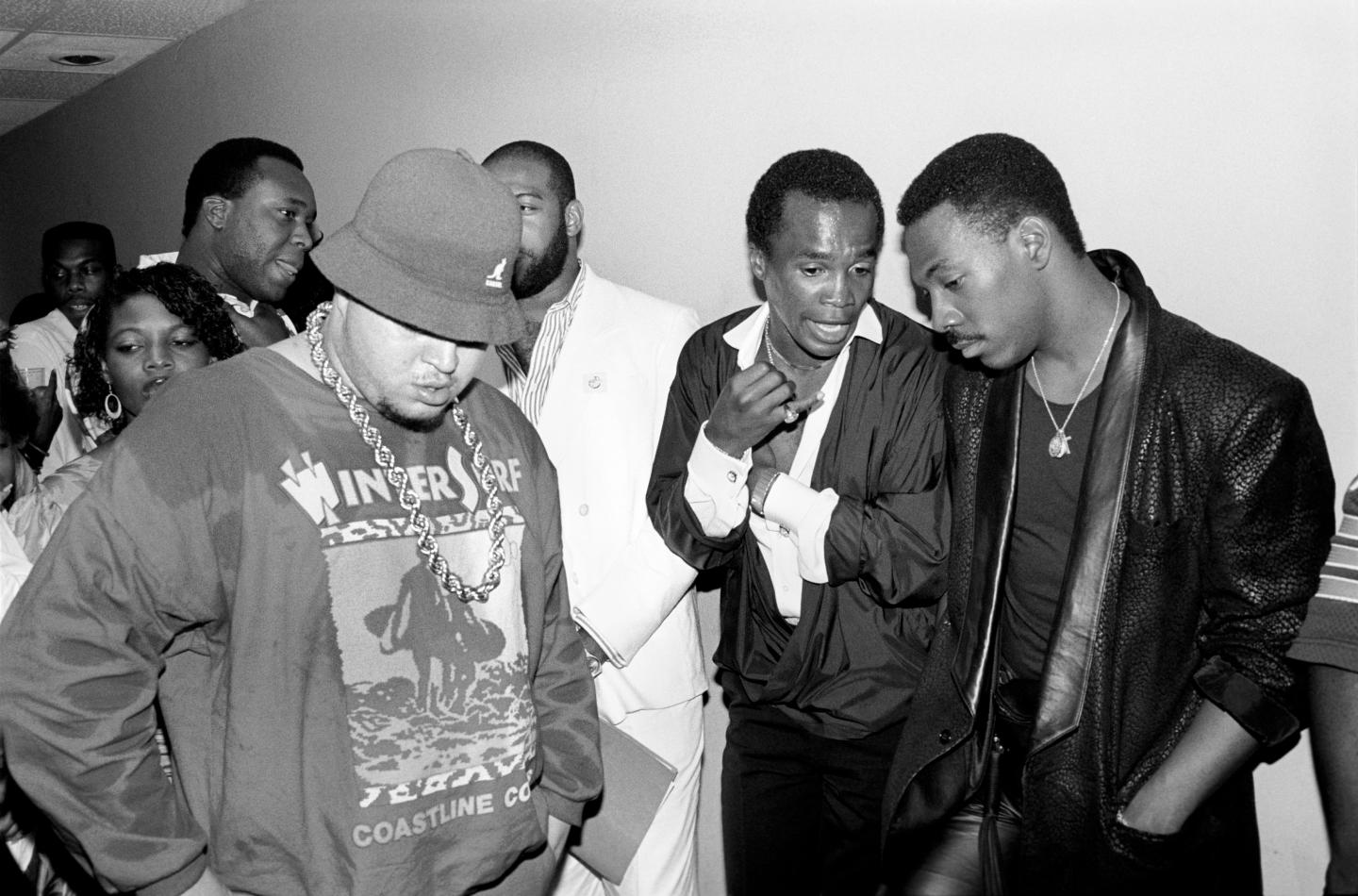 (MANDATORY CREDIT Ebet Roberts/Redferns) Prince Markie Dee of the Fat Boys with Sugar Ray Leonard and Eddie Murphy at the premiere for the Fat Boys 'Disorderlies' movie in New York City on August 13, 1987. (Photo by Ebet Roberts/Redferns)