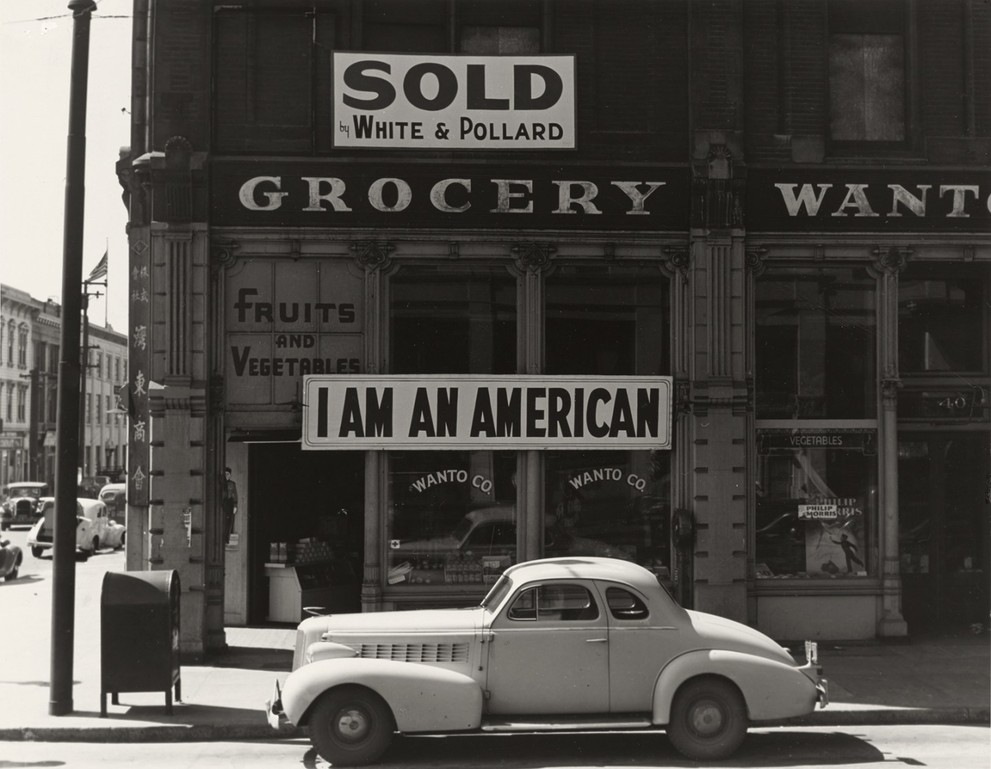 The New Woman Behind the Camera-Japanese-American-owned-grocery-store,-Oakland,-California,-March-1942