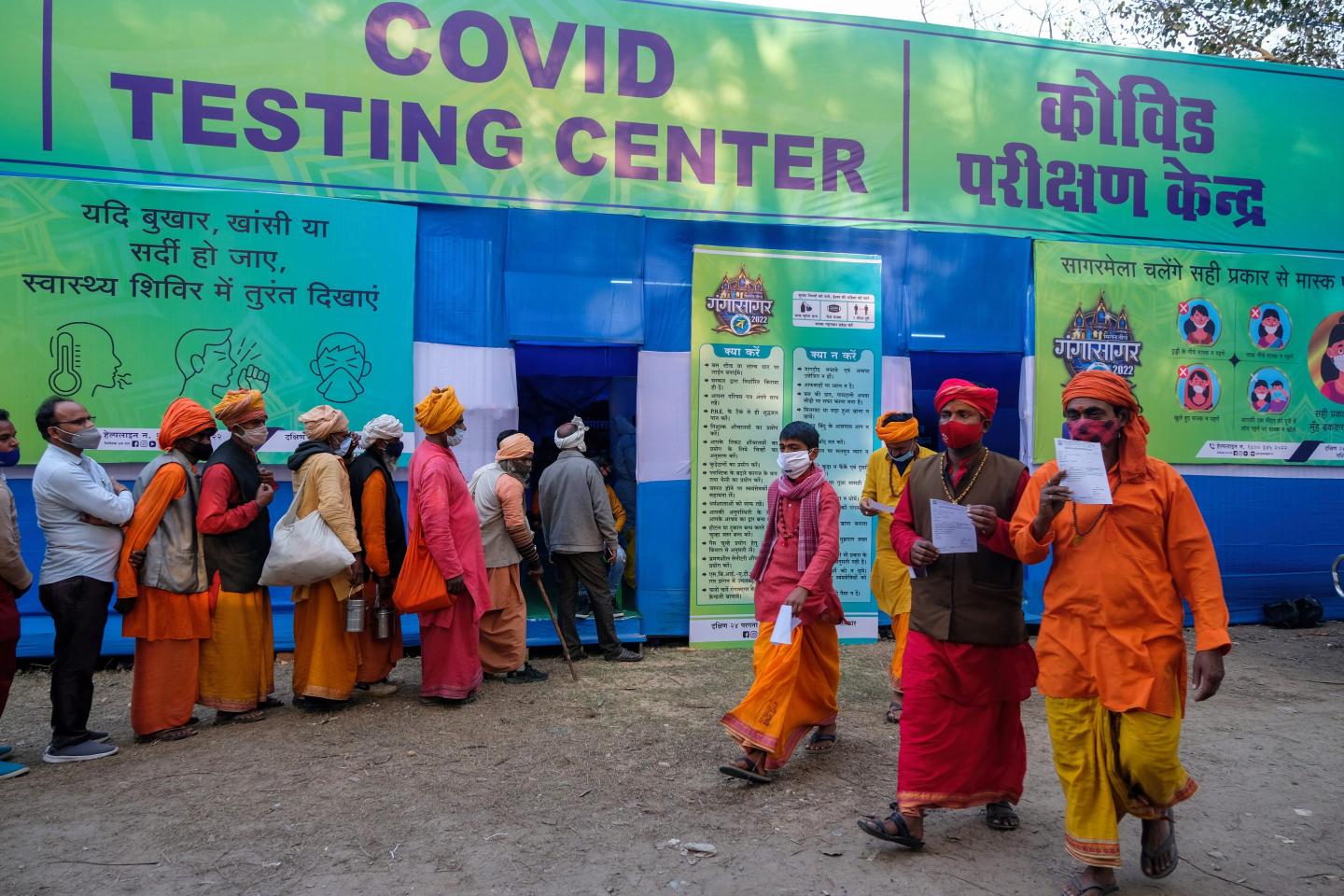 Pilgrims and sadhus are in queue to get their Covid-19 test