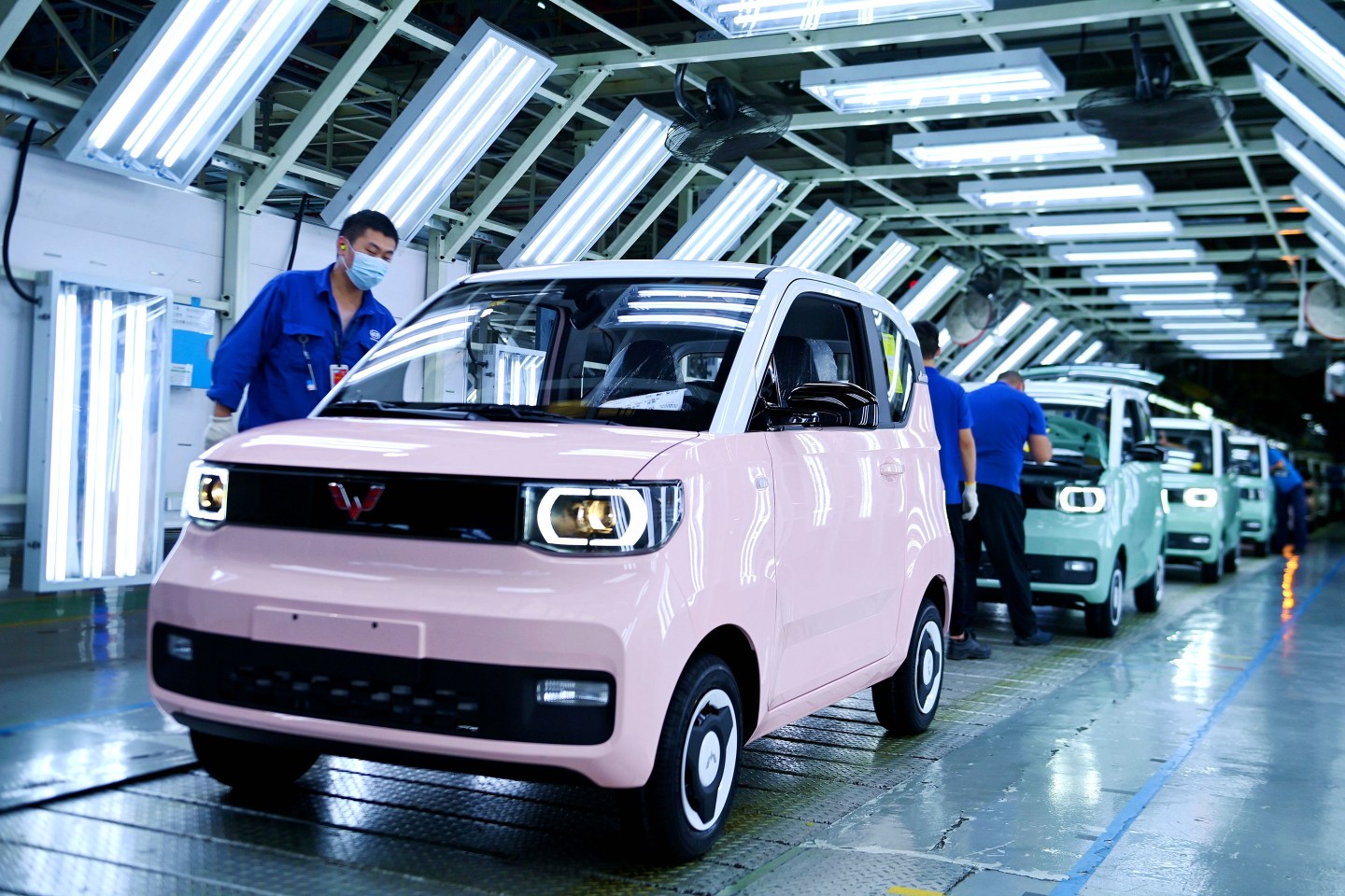 New Wuling Mini EVs roll off the production line at a Qingdao, China, plant.