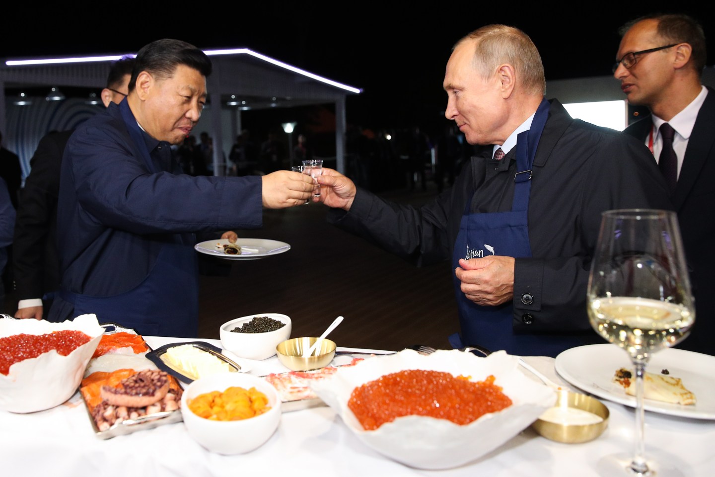 Photo of Chinese president Xi Jinping and Russian president Vladimir Putin making a toast at a forum in Vladivostok, Russia, in September 2018.