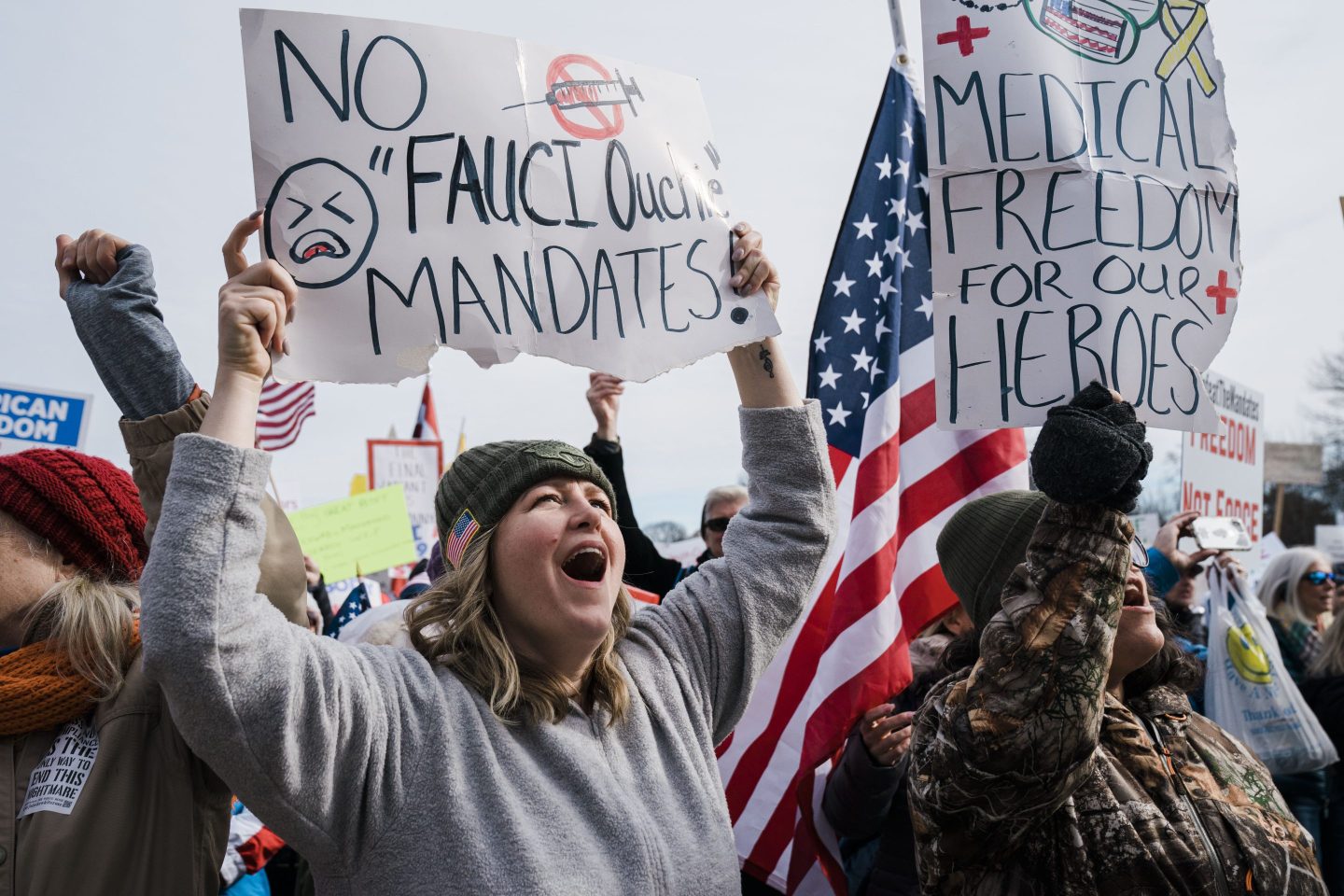 Woman attends mandates rally