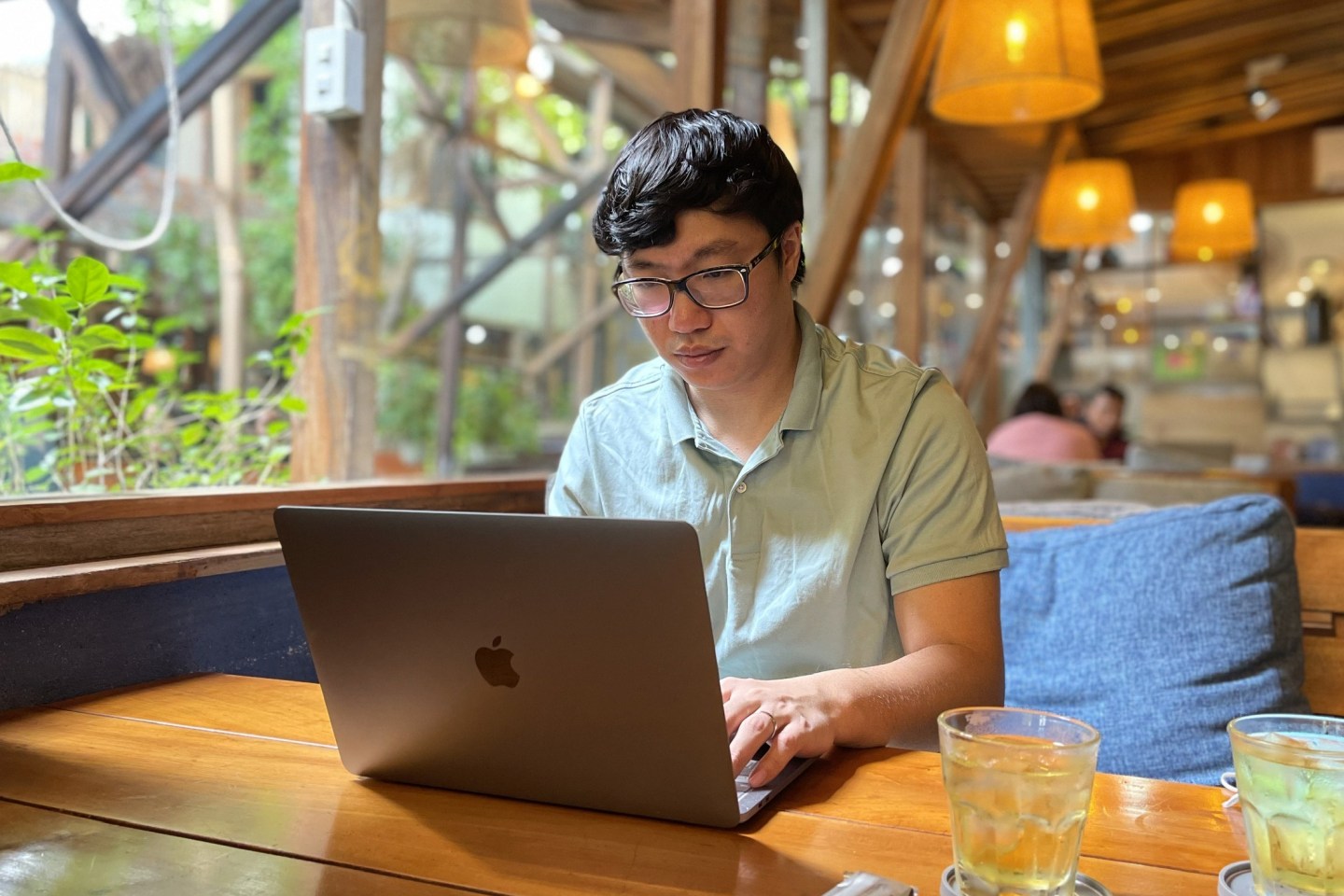 Sky Mavis CEO Trung Nguyen works on his laptop.