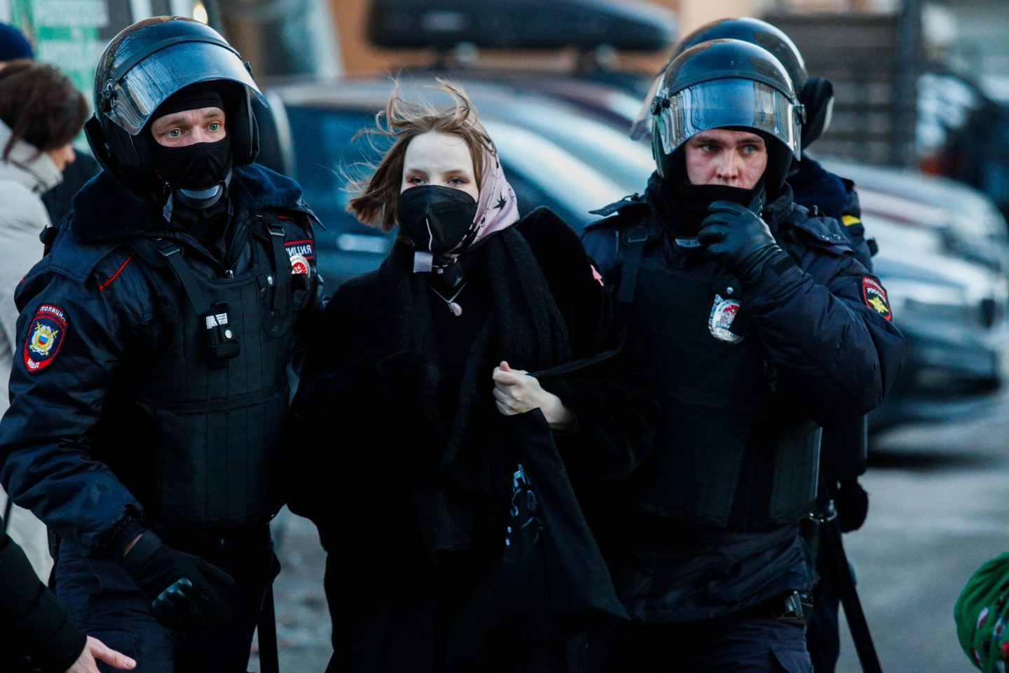 Photo of Russian riot police with anti-war protestor in St. Petersburg, Russia on February 27, 2022.