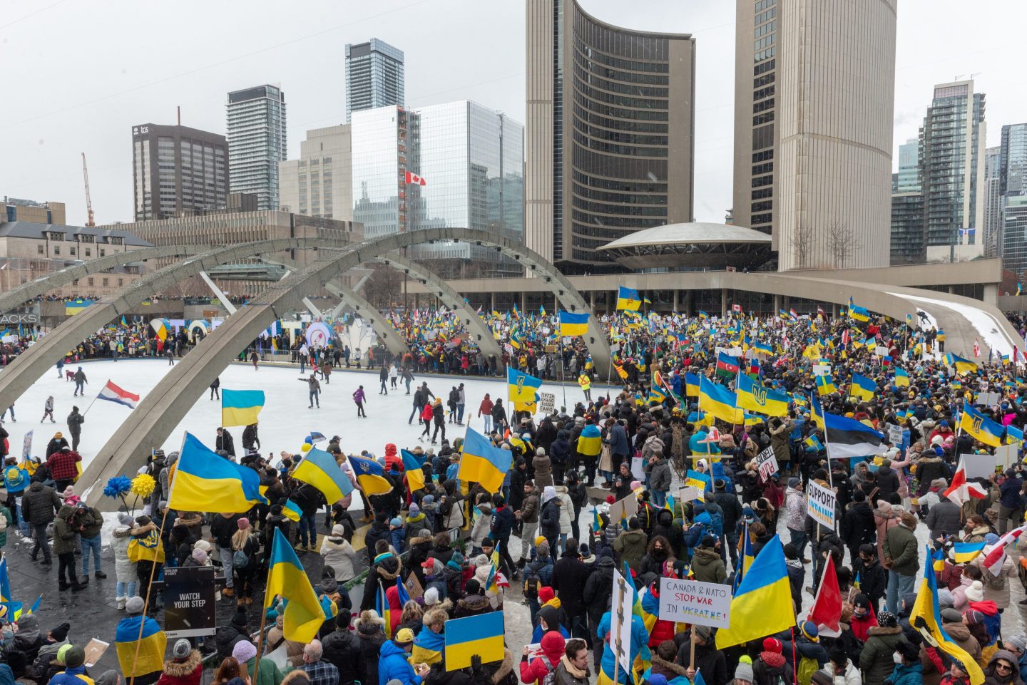 A photo of demonstrators protesting against Russia's War on Ukraine in downtown Toronto in March 2022.