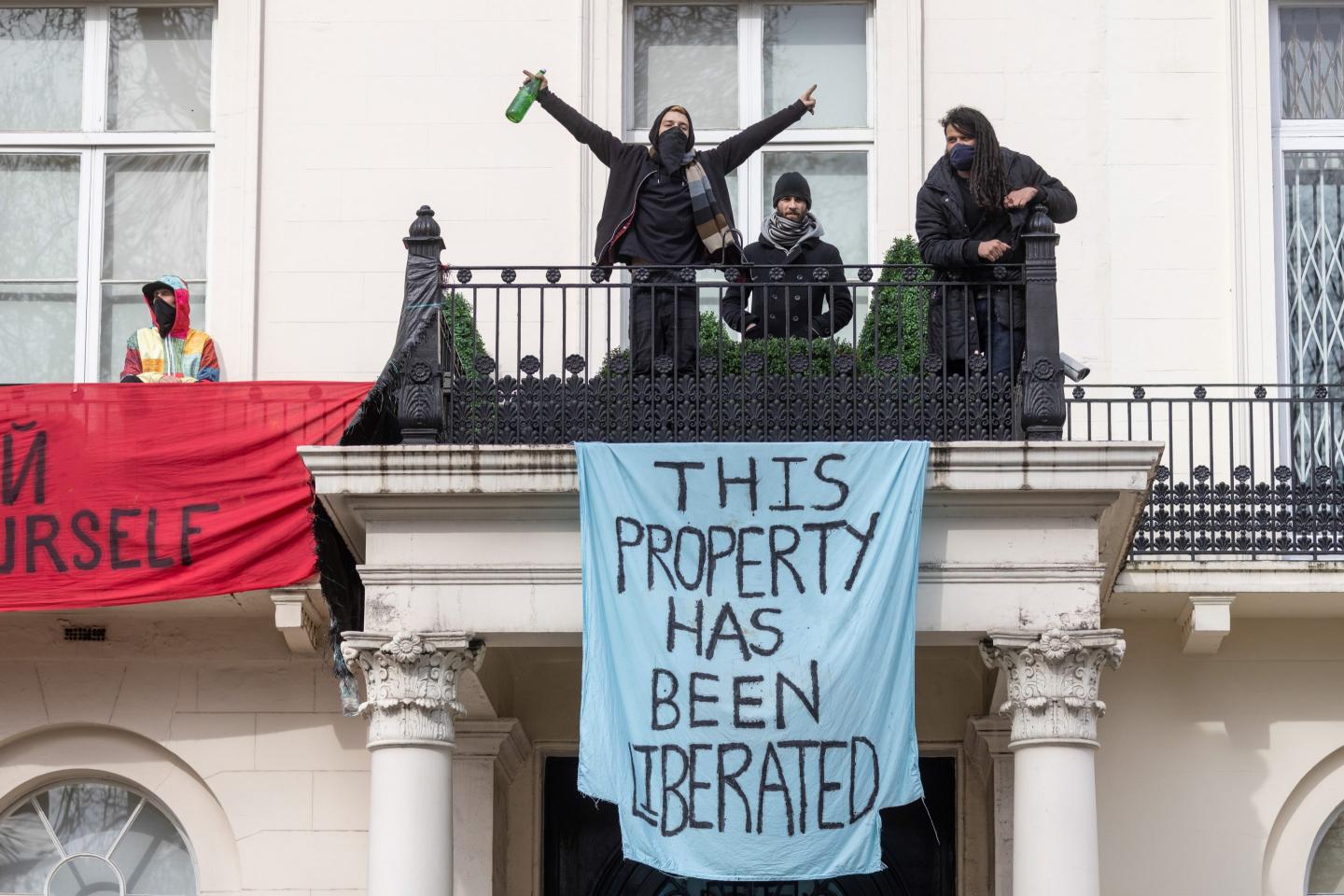 People protesting the invasion of Ukraine occupy a mansion