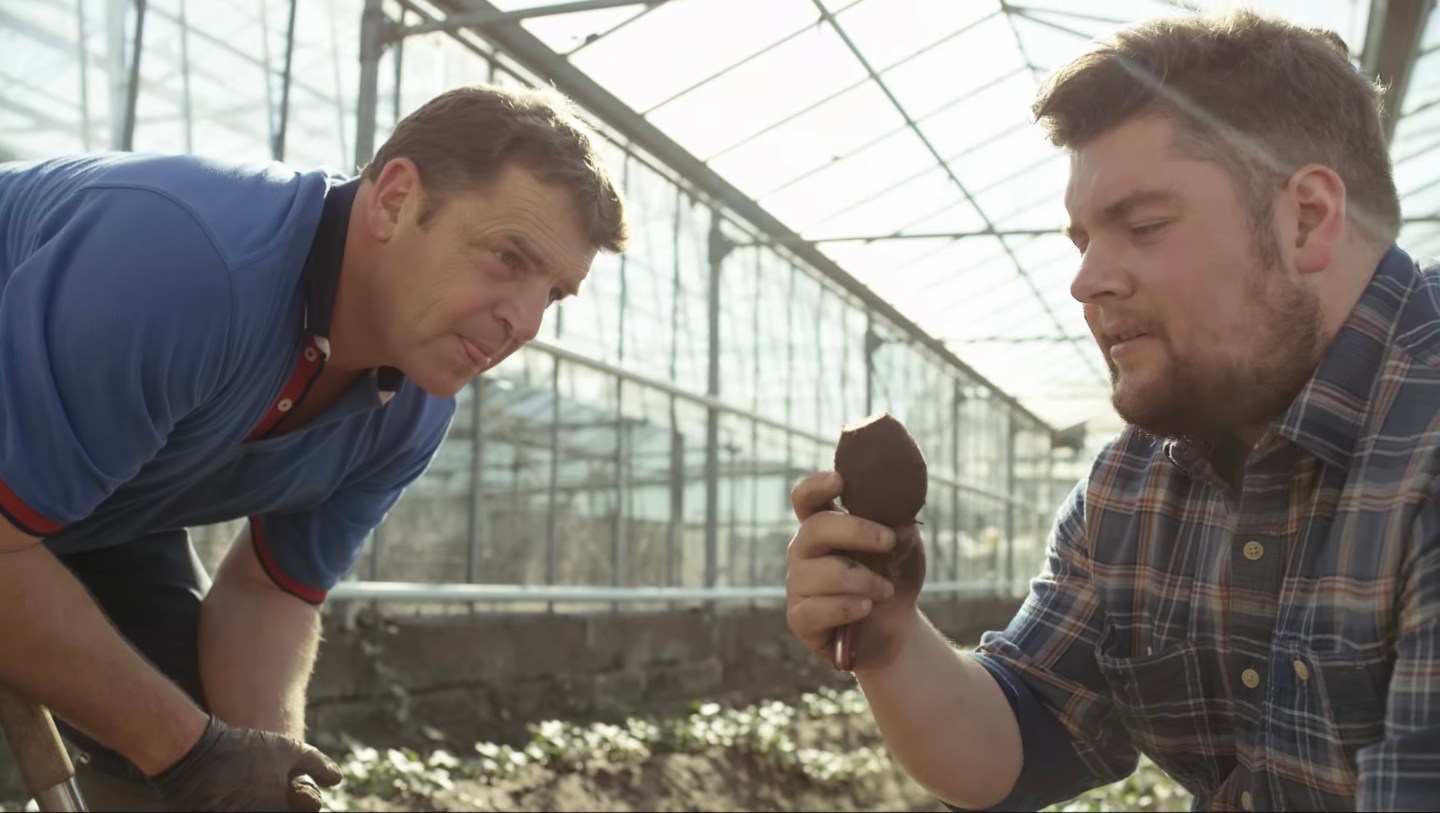 Sam Dennigan pictured with a colleague ensuring sustainable practices for his food brand