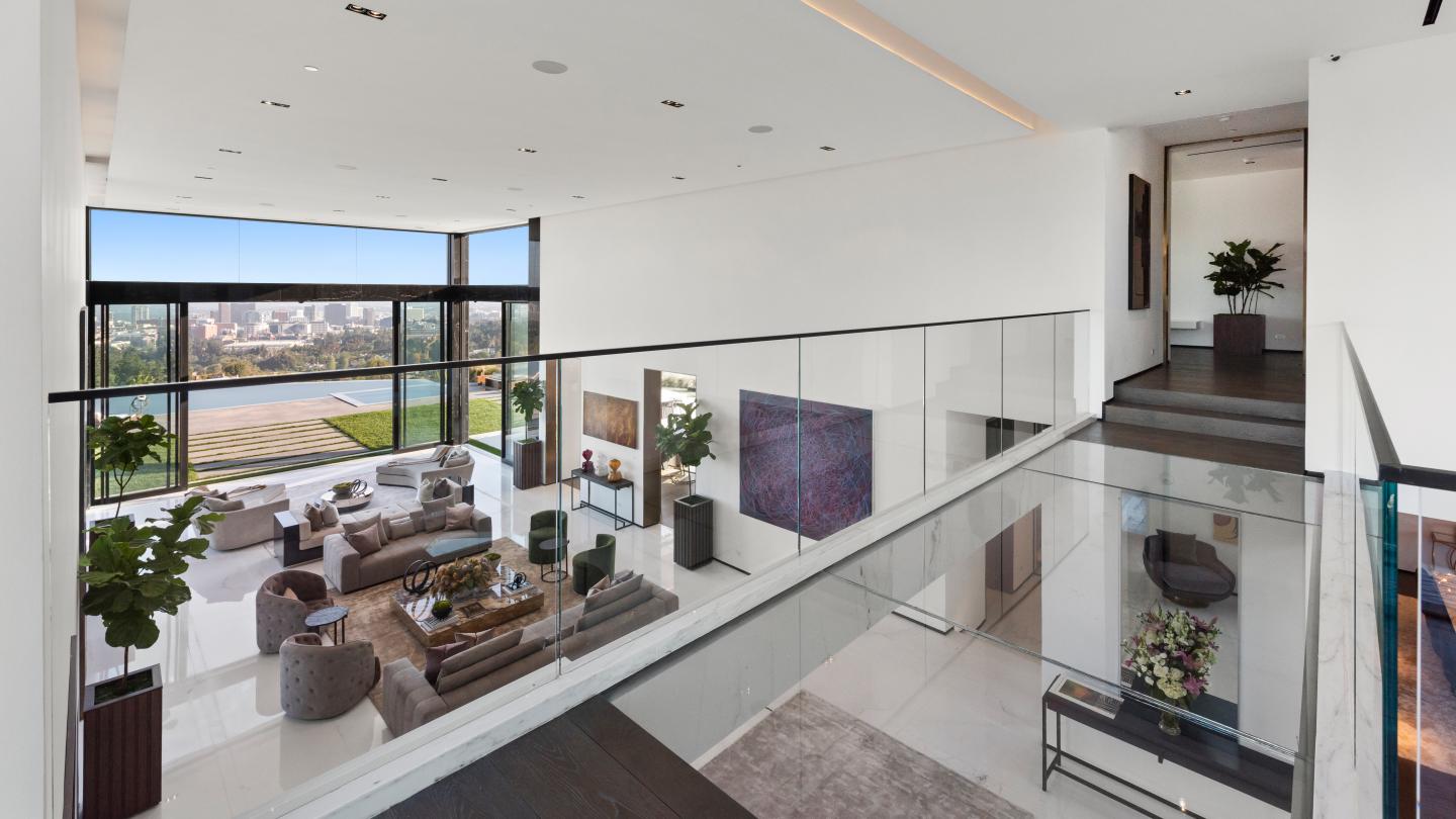 A view of the property's reception room, with a view of the city.