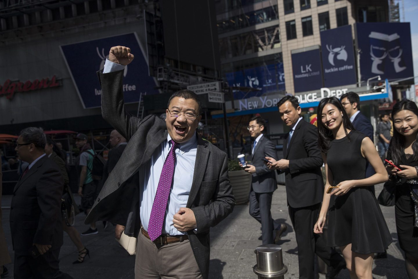 Then-Chairman of Luckin Cofee Charles Lu celebrates after Luckin's Nasdaq debut