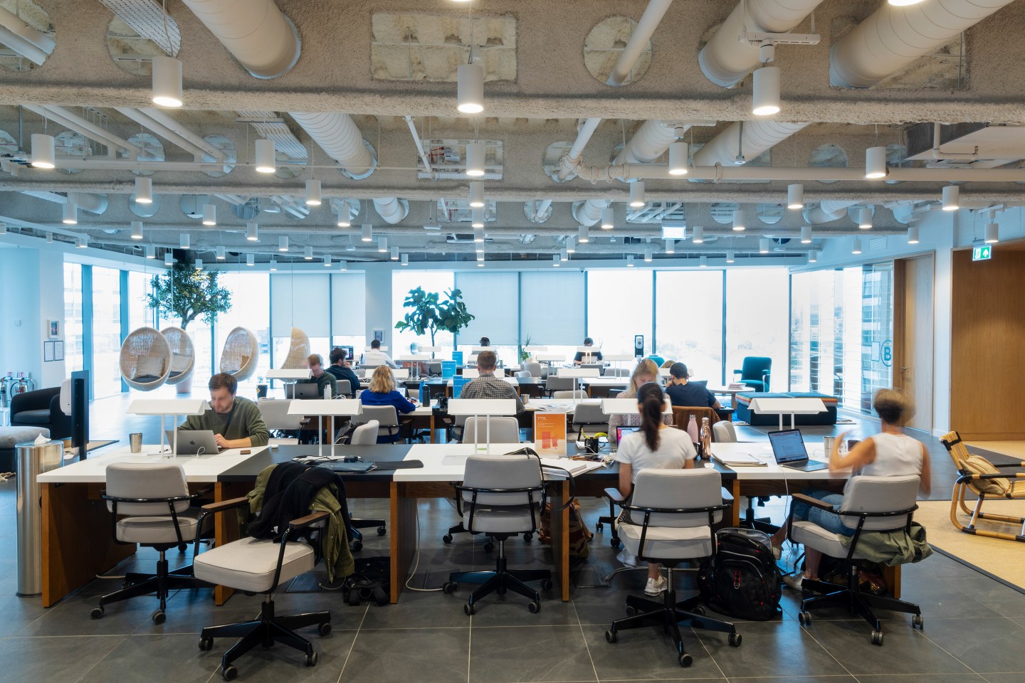 WeWork’s modern open layout office space.