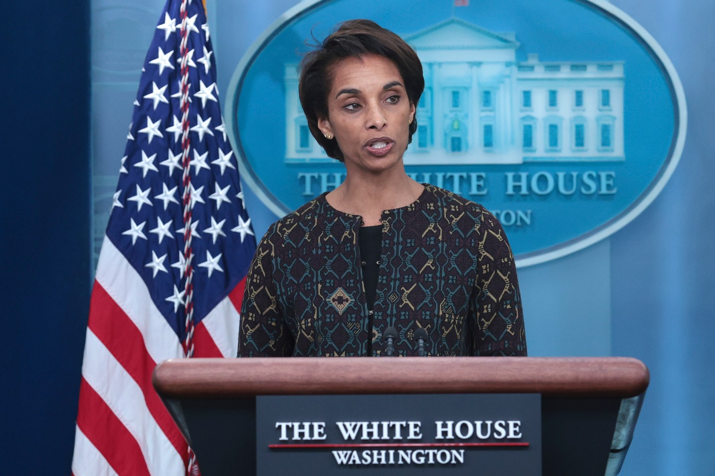 Cecilia Rouse, chair of the Council of Economic Advisors, answers questions behind a podiumduring the daily press briefing