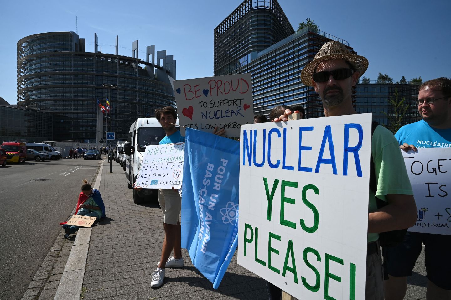 Pro-nuclear protesters take part in demonstrations ahead of a vote at the European Parliament on a motion to block the European Commission's plans to grant a green label to gas and nuclear investments, in Strasbourg, eastern France, on July 6, 2022.