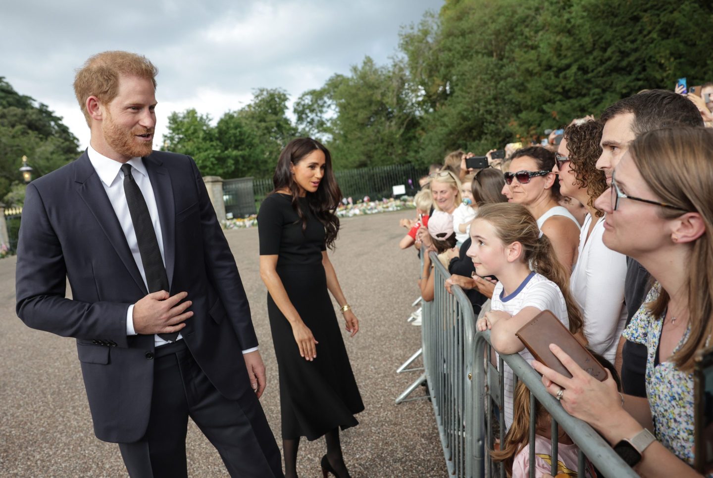 The Prince and Princess of Wales Accompanied By The Duke And Duchess Of Sussex Greet Wellwishers Outside Windsor Castle