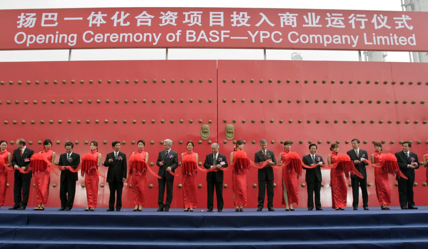 Chinese and German government officials and executives from BASF AG and Sinopec cut the ribbon Wednesday, September 28, 2005 to officially open their new joint venture facility outside of Nanjing, China.