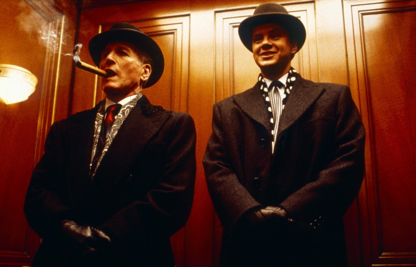 Paul Newman and Tim Robbins in an elevator in a scene from the movie The Hudsucker Proxy.
