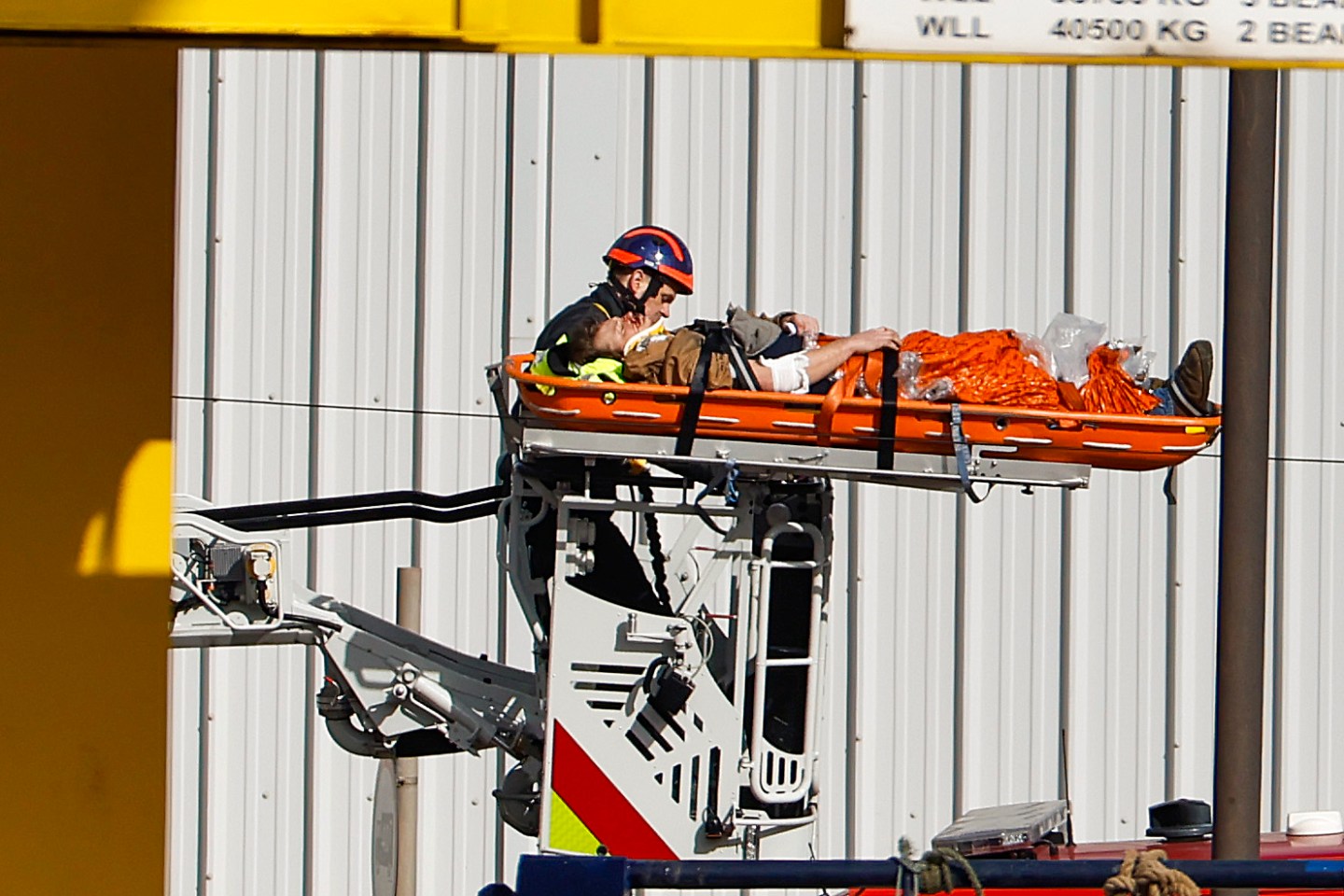 patient being taken to hospital in stretcher