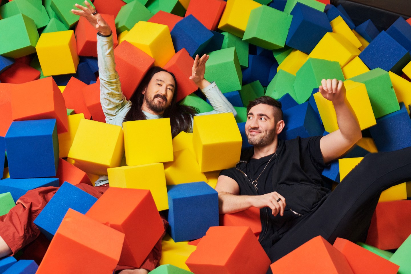 Aoki and Blau jump in the foam pit at Aoki's home in Las Vegas.