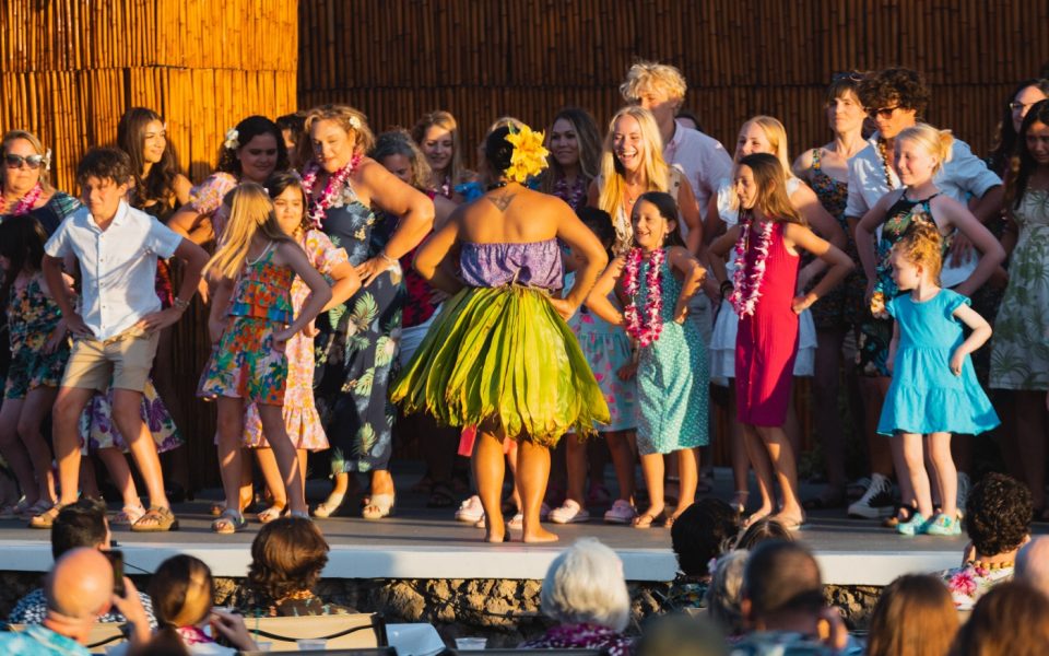 Tourists learning hula dance at Royal Lahaina Resort in Maui, Hawaii