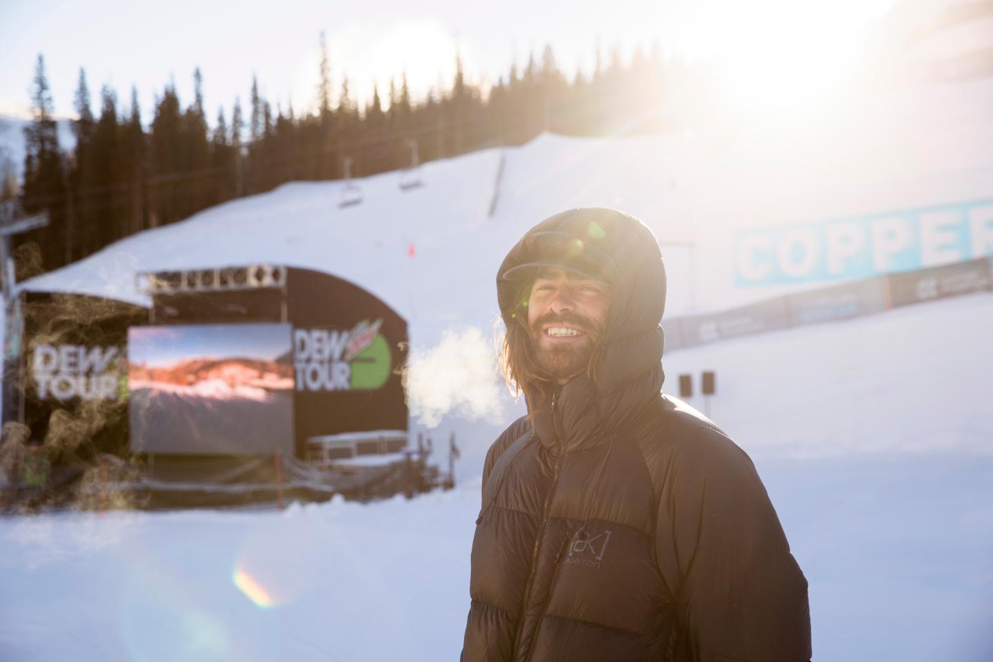 Danny Davis, snowboarder, on a ski hill