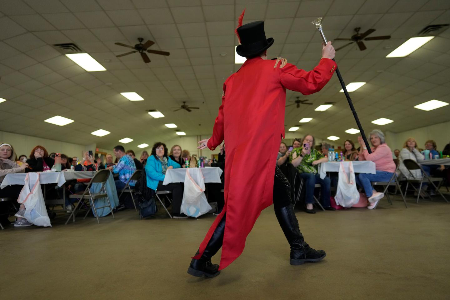 Drag king Xander Valentine, aka Gwen Bobbie, performs "The Greatest Show" from the movie "The Greatest Showman" for the sold-out "Drag Bingo" fundraiser at the Nescopeck Township Volunteer Fire Company Social Hall, in Nescopeck, Pa., Saturday, March 18, 2023.