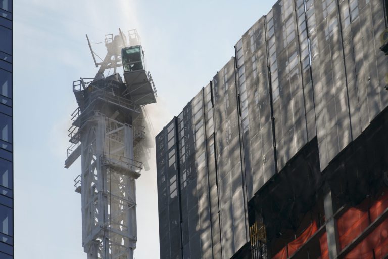 Burning construction crane falls in midtown Manhattan Fortune