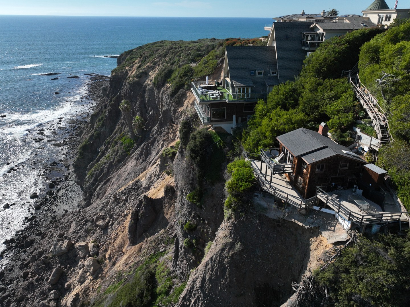 Aerial view of houses overlooking a cliff in Dana Point, California