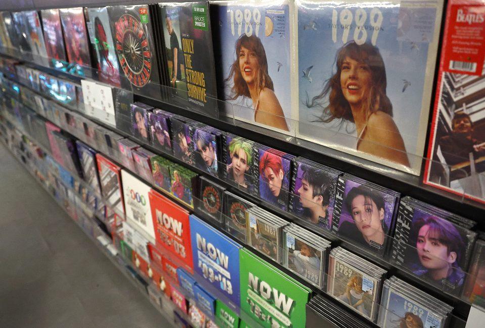 A store display of vinyl records, with one of Taylor Swift’s prominently highlighted
