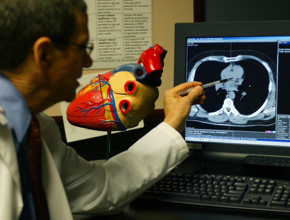 Photo of Dr. Daniel Berman discusses coronary calcium scan with patient at Cedars Sinai Medical Center, Los Angeles. November 13, 2003.
